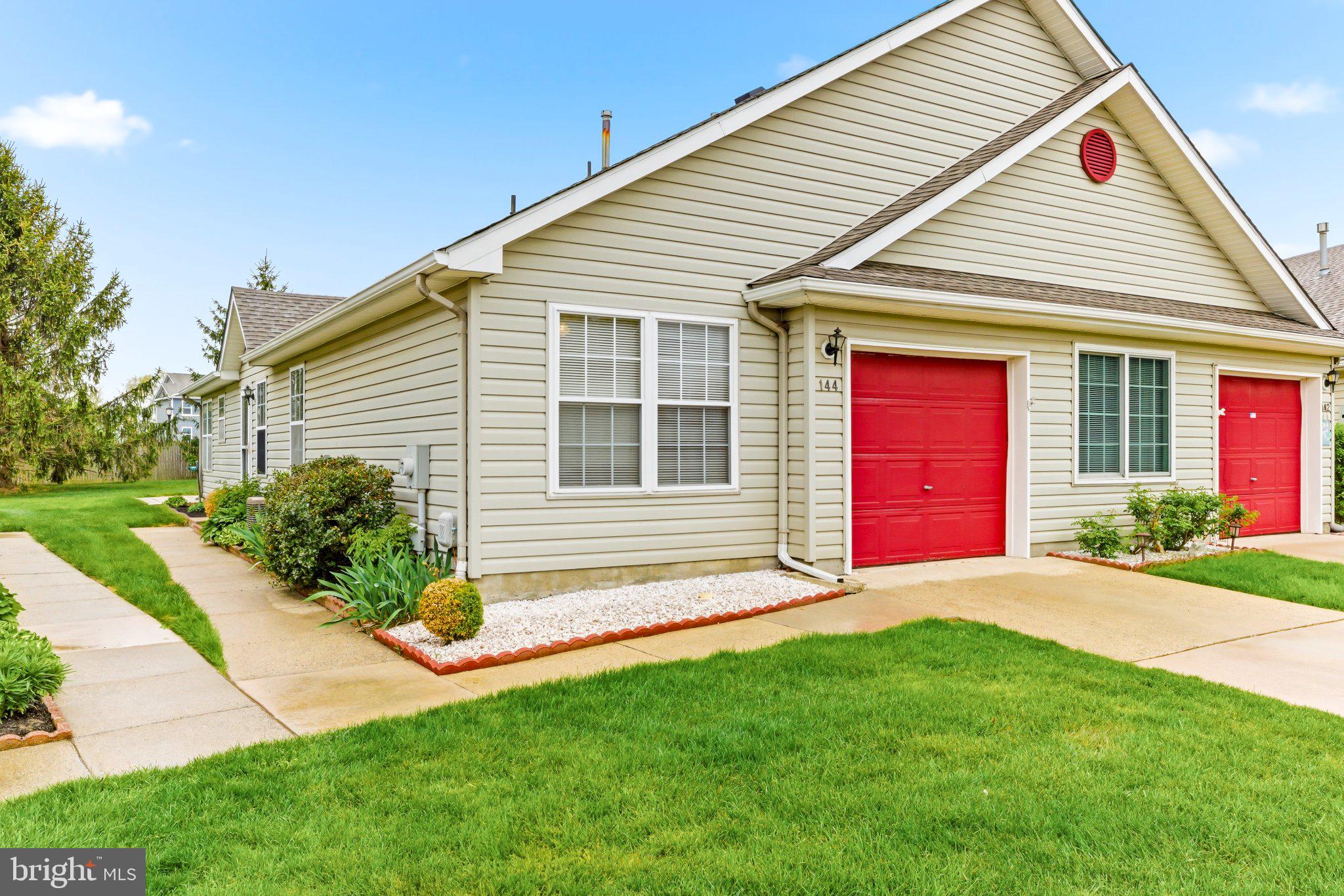 144 Alexander Road Beverly, NJ 08010 - Photo 3 of 23 Charming home with vibrant red accents.