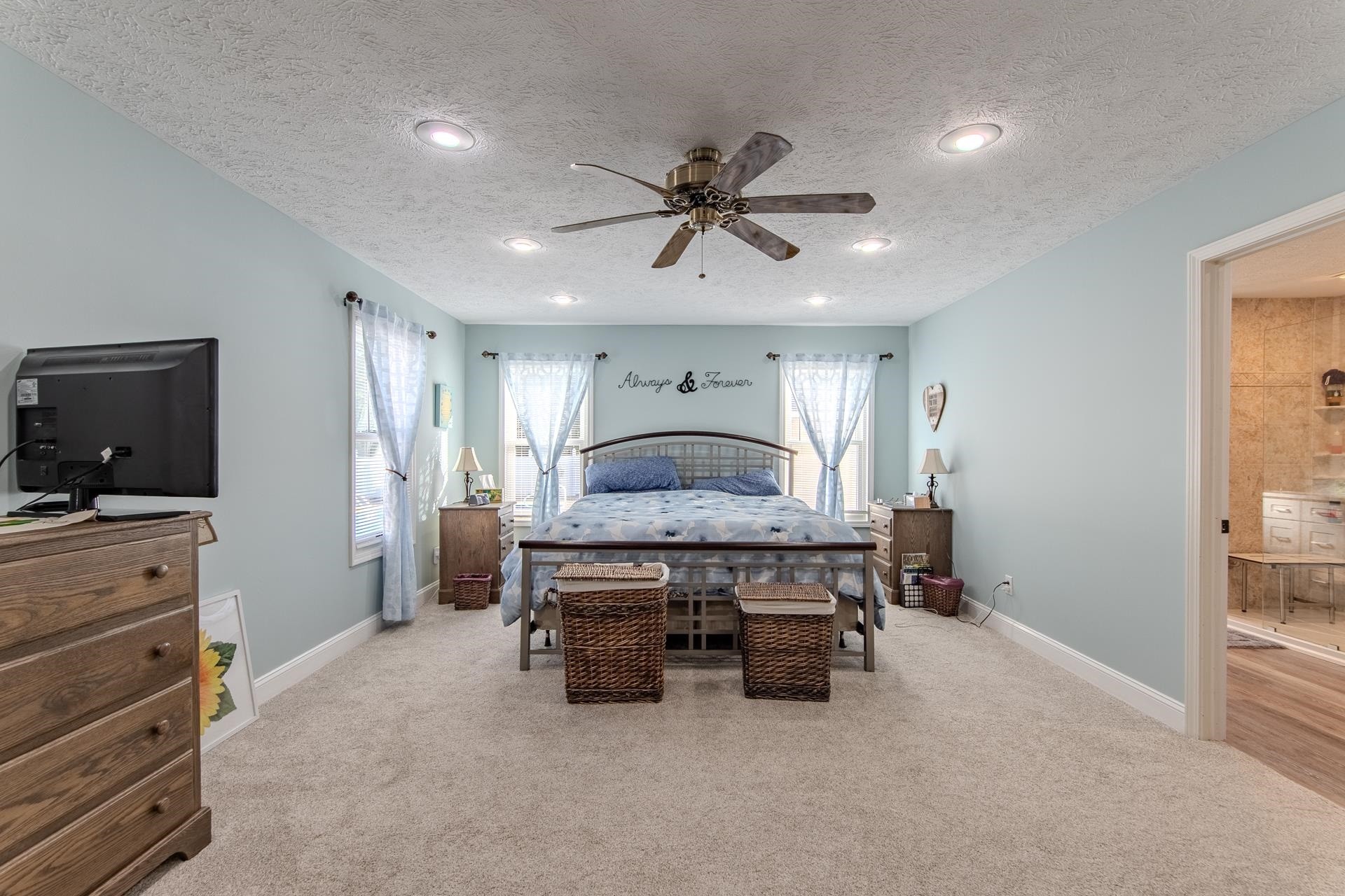 145 Tom Way Savannah, TN 38372 - Photo 13 of 40 a living room with furniture and a flat screen tv