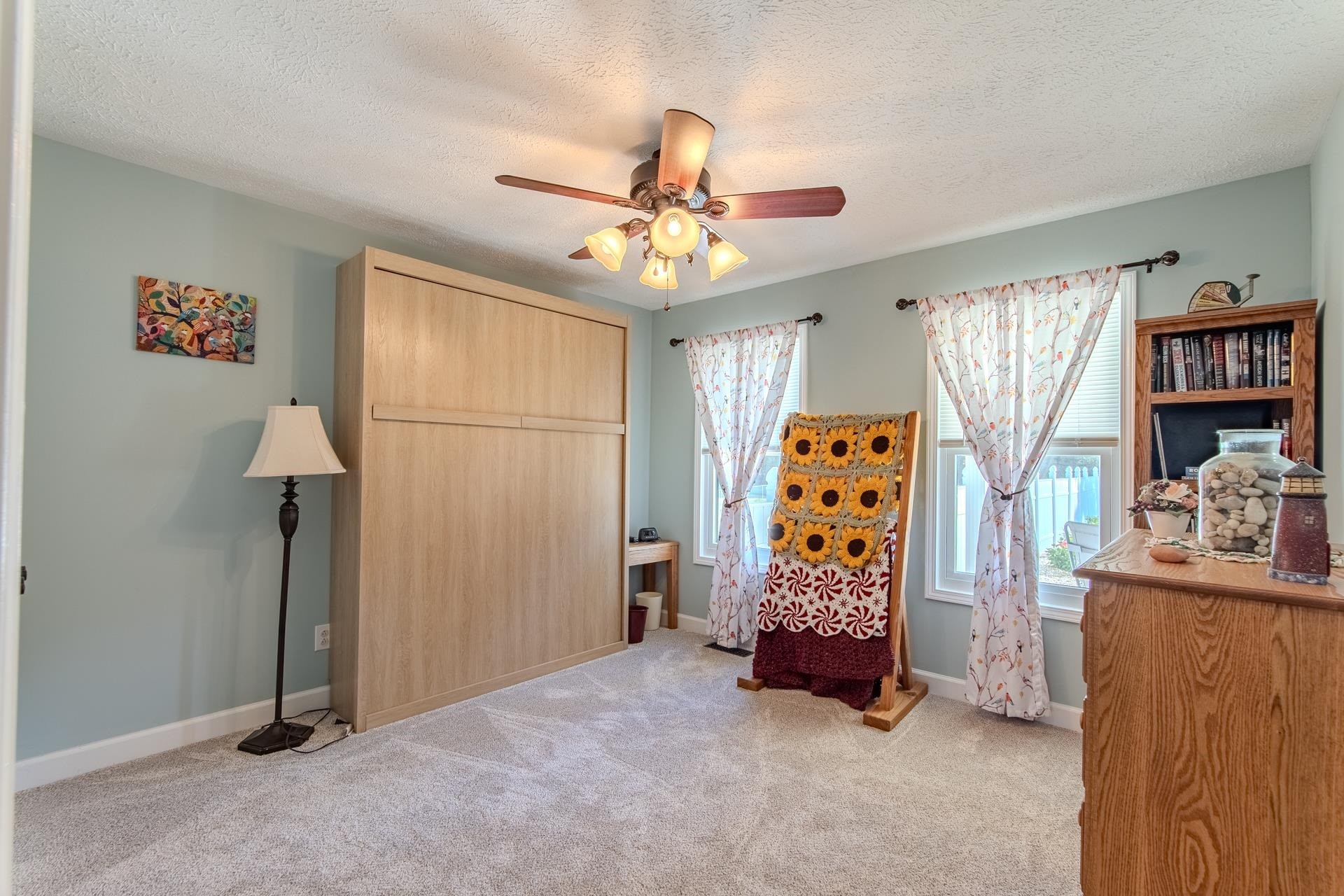 145 Tom Way Savannah, TN 38372 - Photo 18 of 40 a view of an empty room with window and cabinet