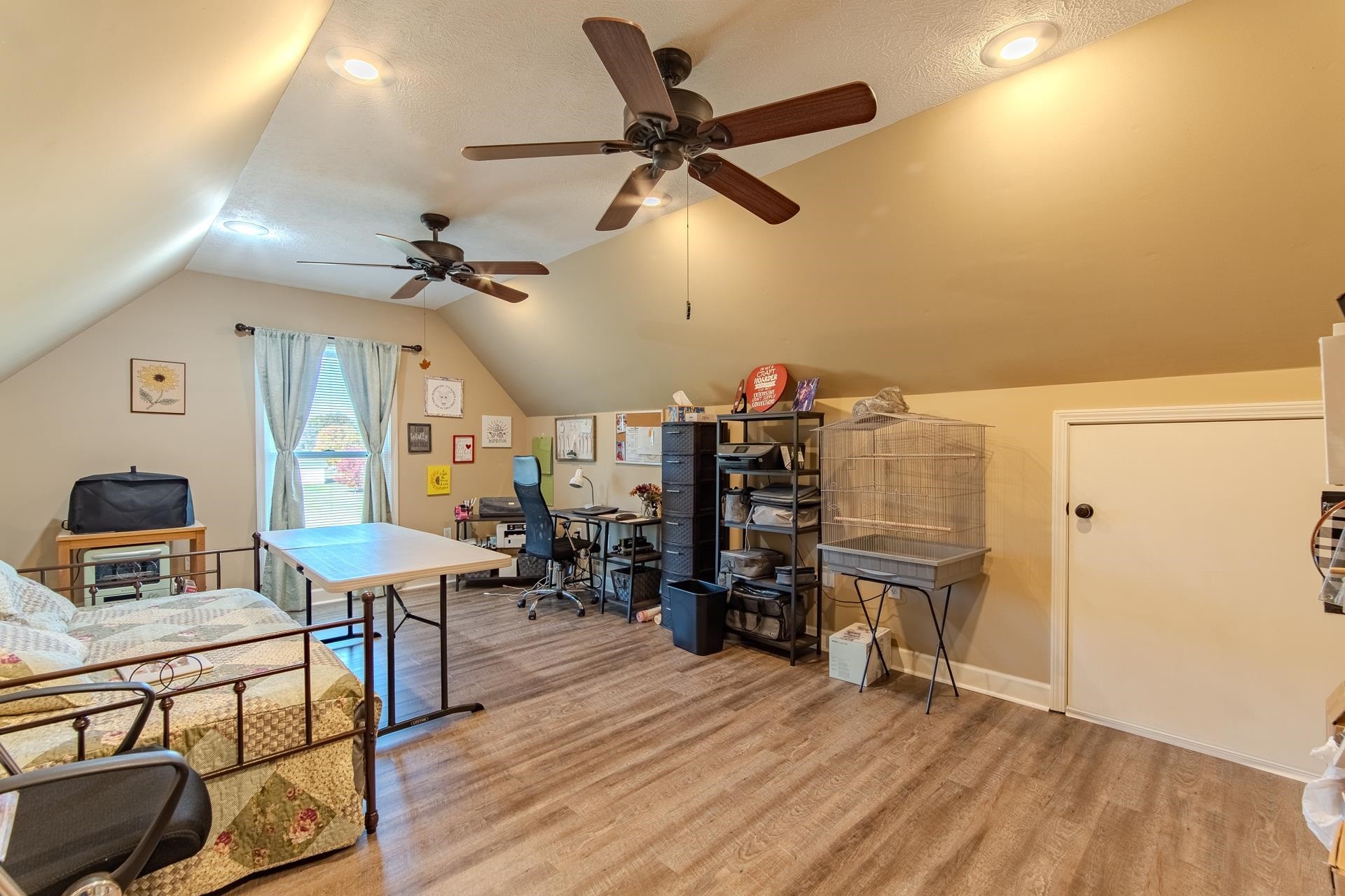 145 Tom Way Savannah, TN 38372 - Photo 23 of 40 a view of a workspace with furniture and a ceiling fan