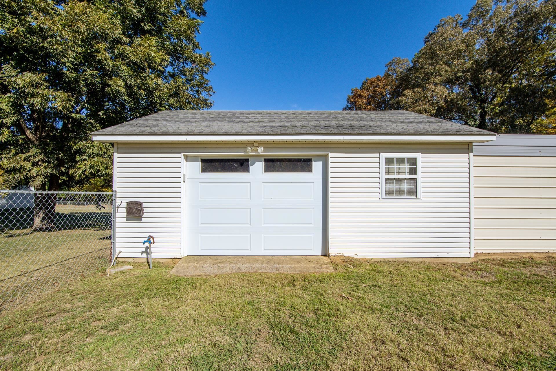 145 Tom Way Savannah, TN 38372 - Photo 32 of 40 a view of a white house