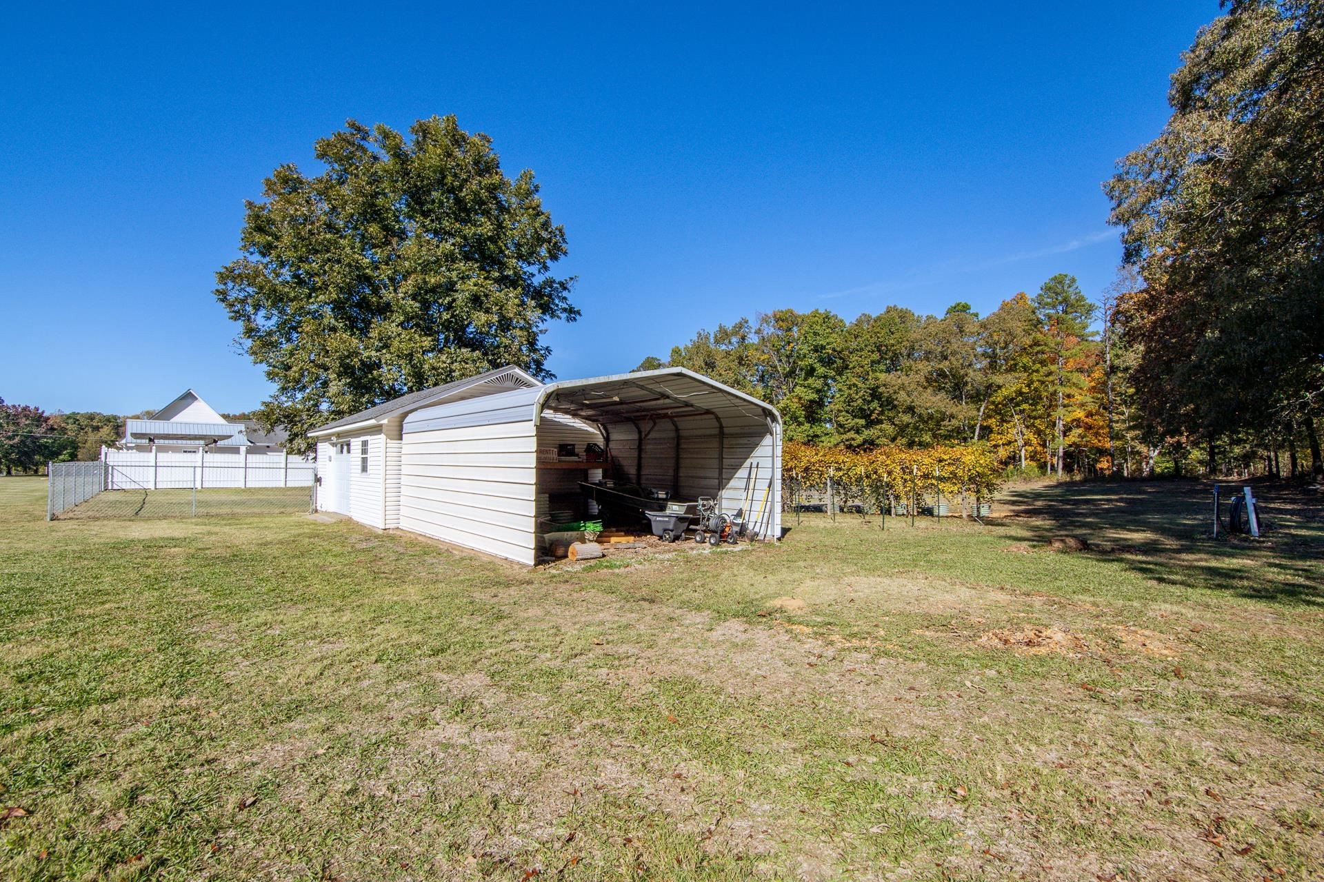 145 Tom Way Savannah, TN 38372 - Photo 33 of 40 a view of a house with a yard
