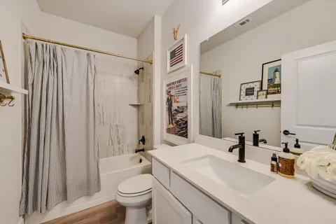 a house view with swimming pool and sitting space