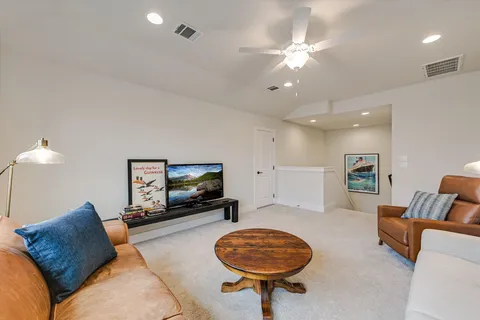 a front view of house with yard and outdoor seating