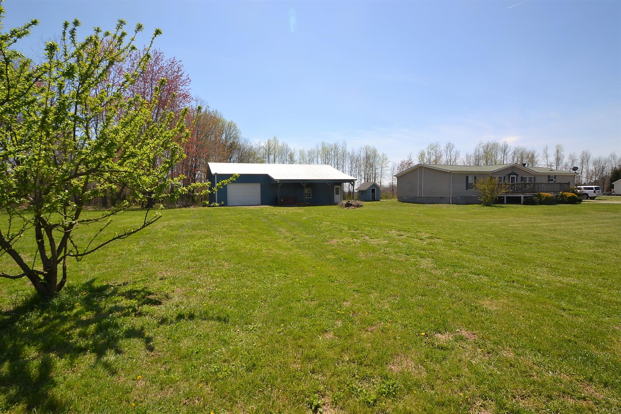 2553 Friendship Road Cross Plains, TN 37049 - Photo 3 of 30 a view of a house with a yard