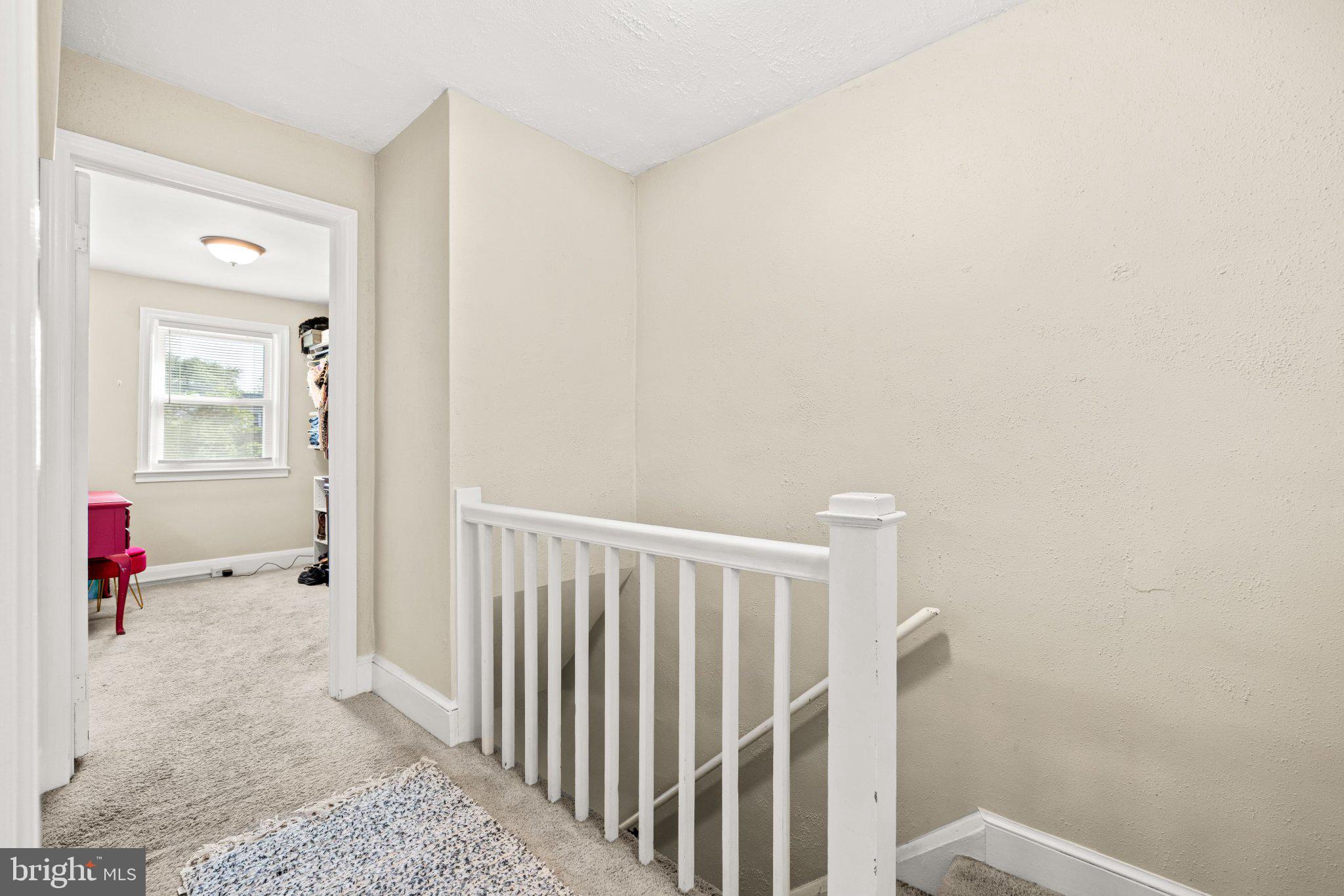 234 West Edgevale Road Baltimore, MD 21225 - Photo 8 of 45 Bright and inviting upstairs hallway.