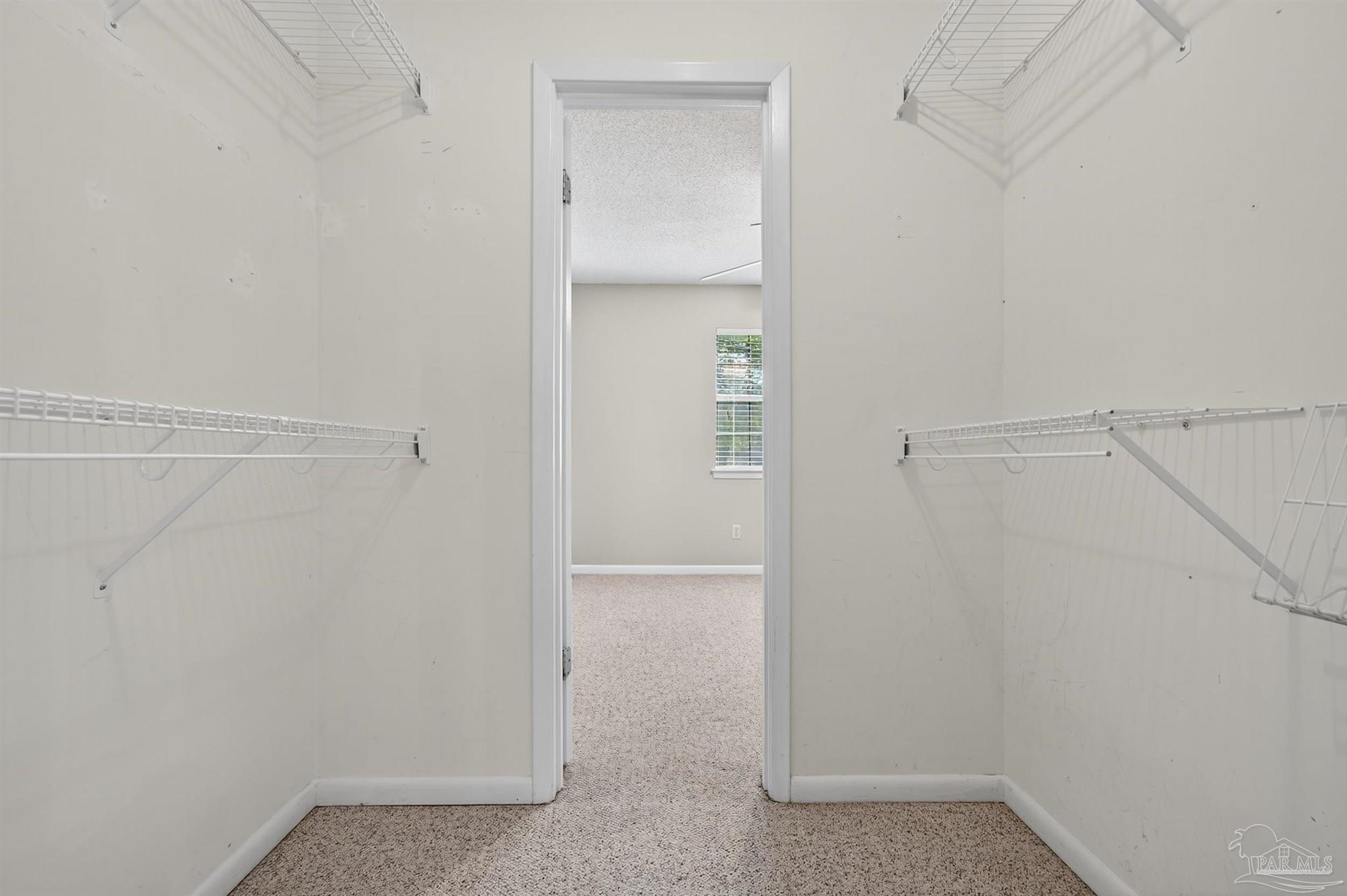 1120 Muscogee Road Cantonment, FL 32533 - Photo 22 of 38 a view of an empty walk in closet