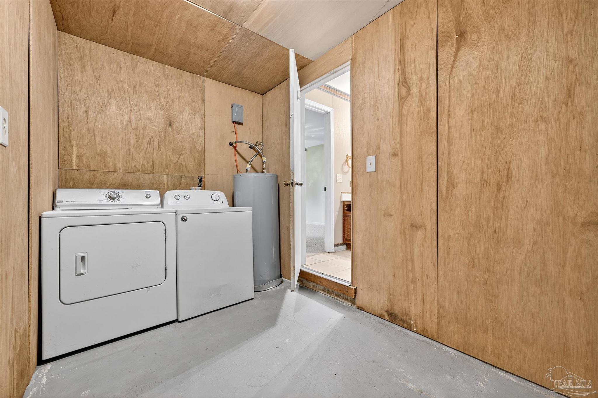 1120 Muscogee Road Cantonment, FL 32533 - Photo 24 of 38 a utility room with dryer and washer