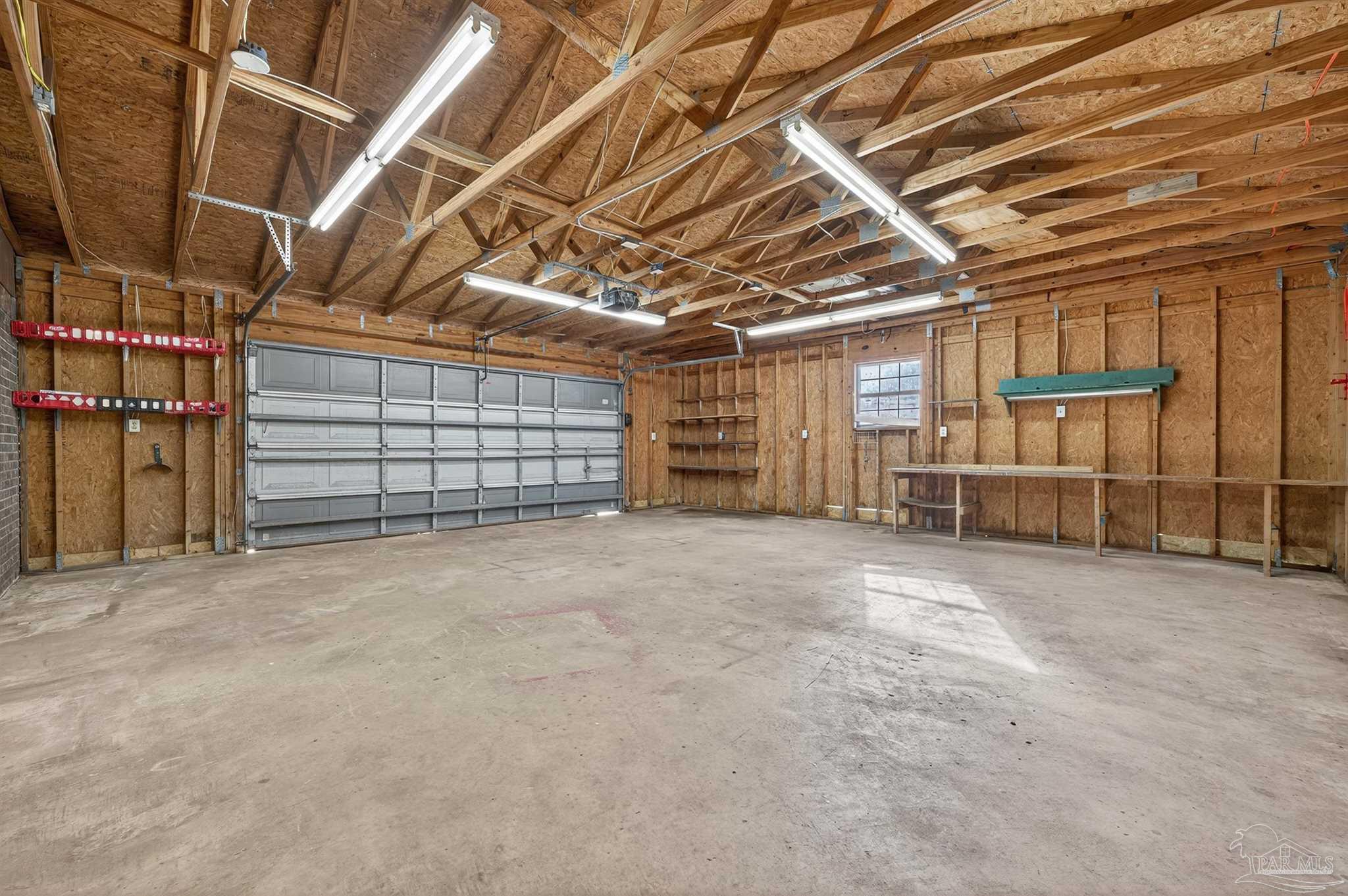 1120 Muscogee Road Cantonment, FL 32533 - Photo 28 of 38 a view of a room with wooden walls