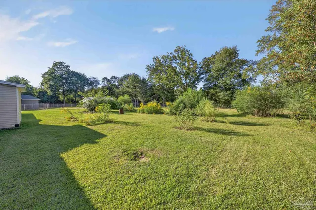 a view of a green yard