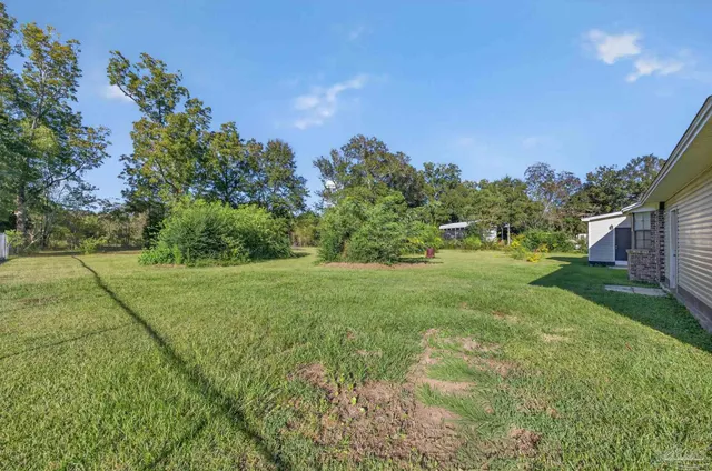 a view of an outdoor space and a yard