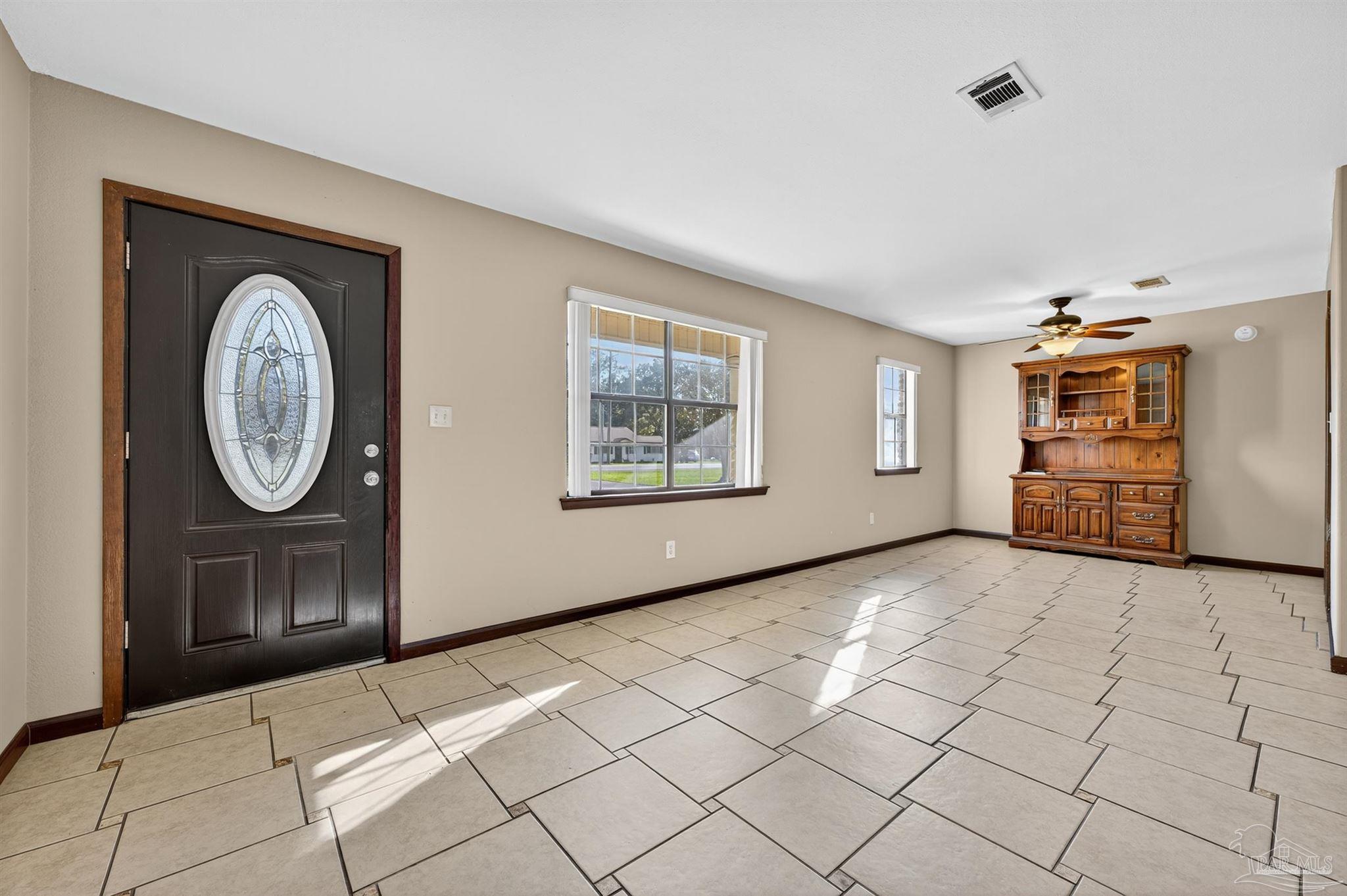 1120 Muscogee Road Cantonment, FL 32533 - Photo 4 of 38 a view of a storage & utility room