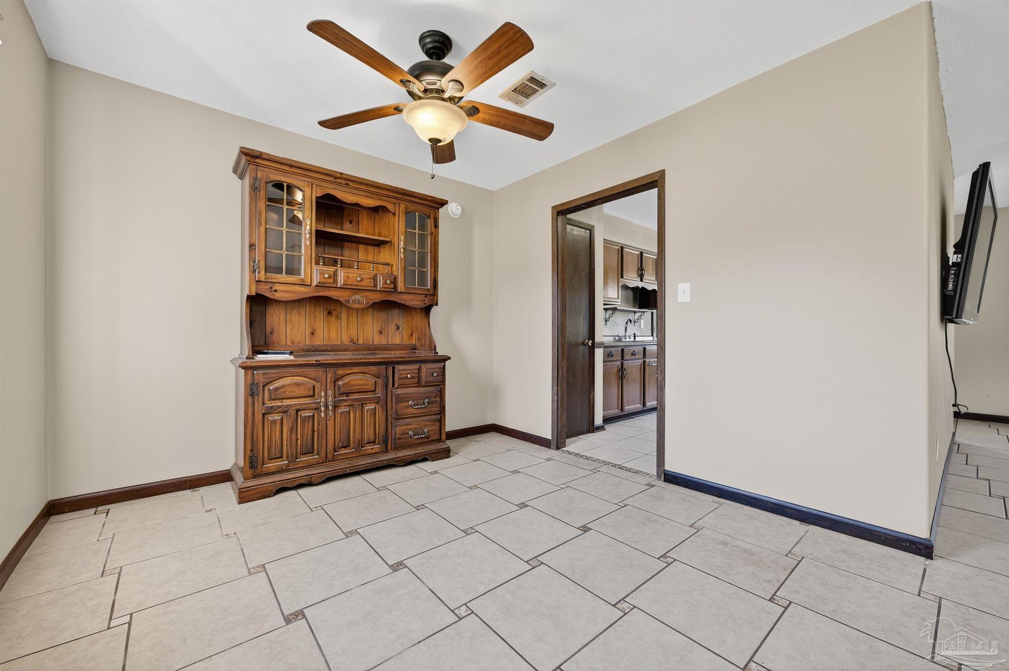 1120 Muscogee Road Cantonment, FL 32533 - Photo 7 of 38 a view of a livingroom with a furniture