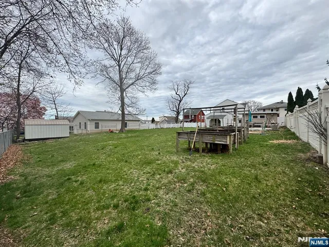 a view of a house with a yard porch and sitting area