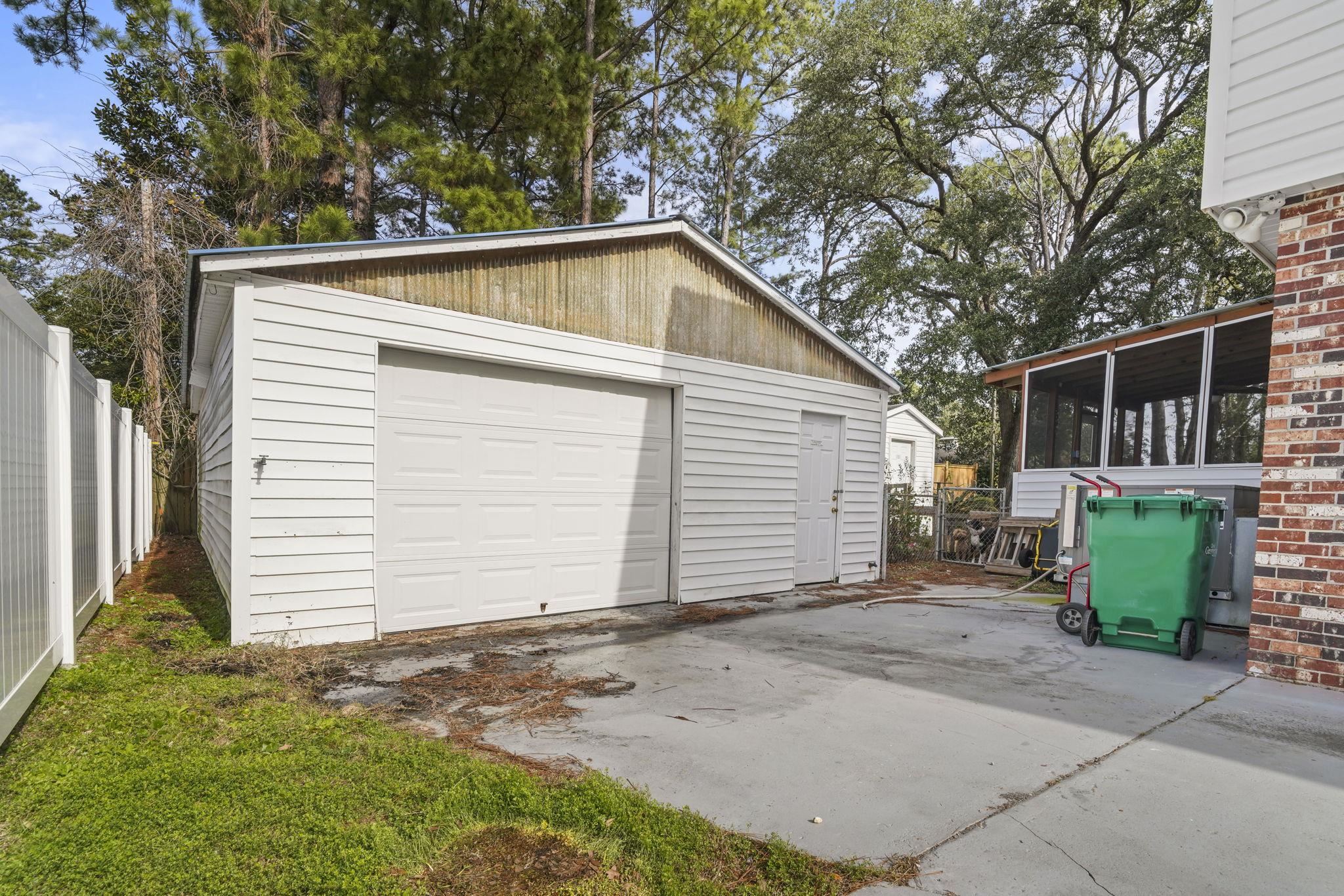 408 Rosemary Street Georgetown, SC 29440 - Photo 26 of 34 Detached garage with concrete driveway