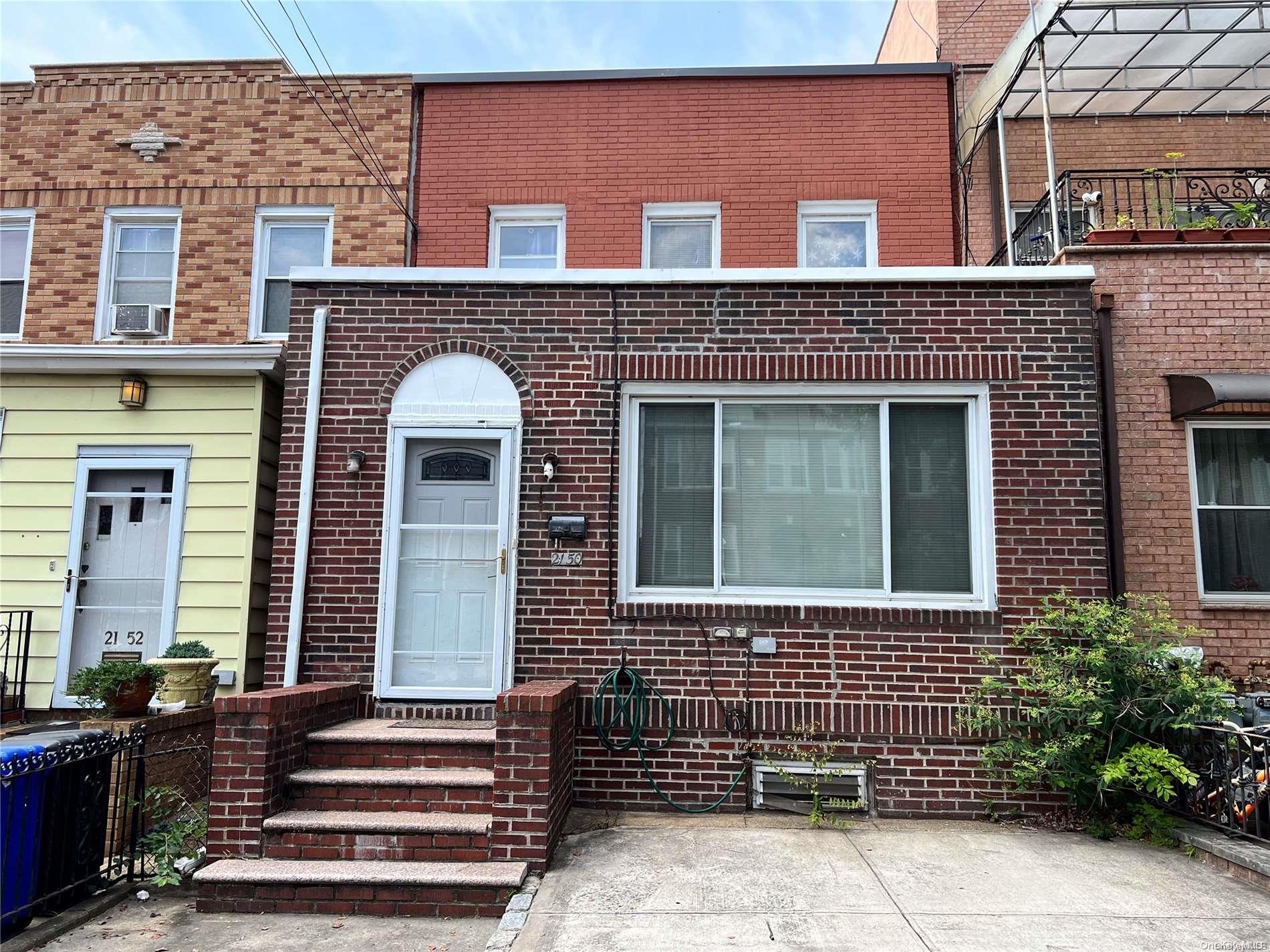 21-50 45th Street Queens, NY 11105 - Photo 1 of 1 a front view of a house