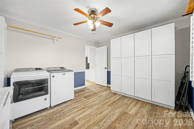 a kitchen with a stove and a microwave
