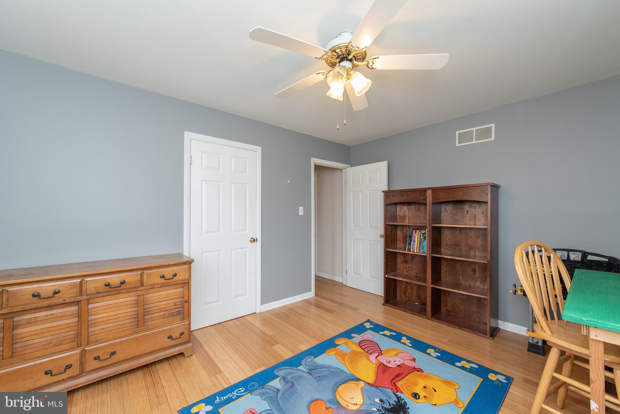 131 Sharon Street Rising Sun, MD 21911 - Photo 22 of 40 a bedroom with a bed and cabinets