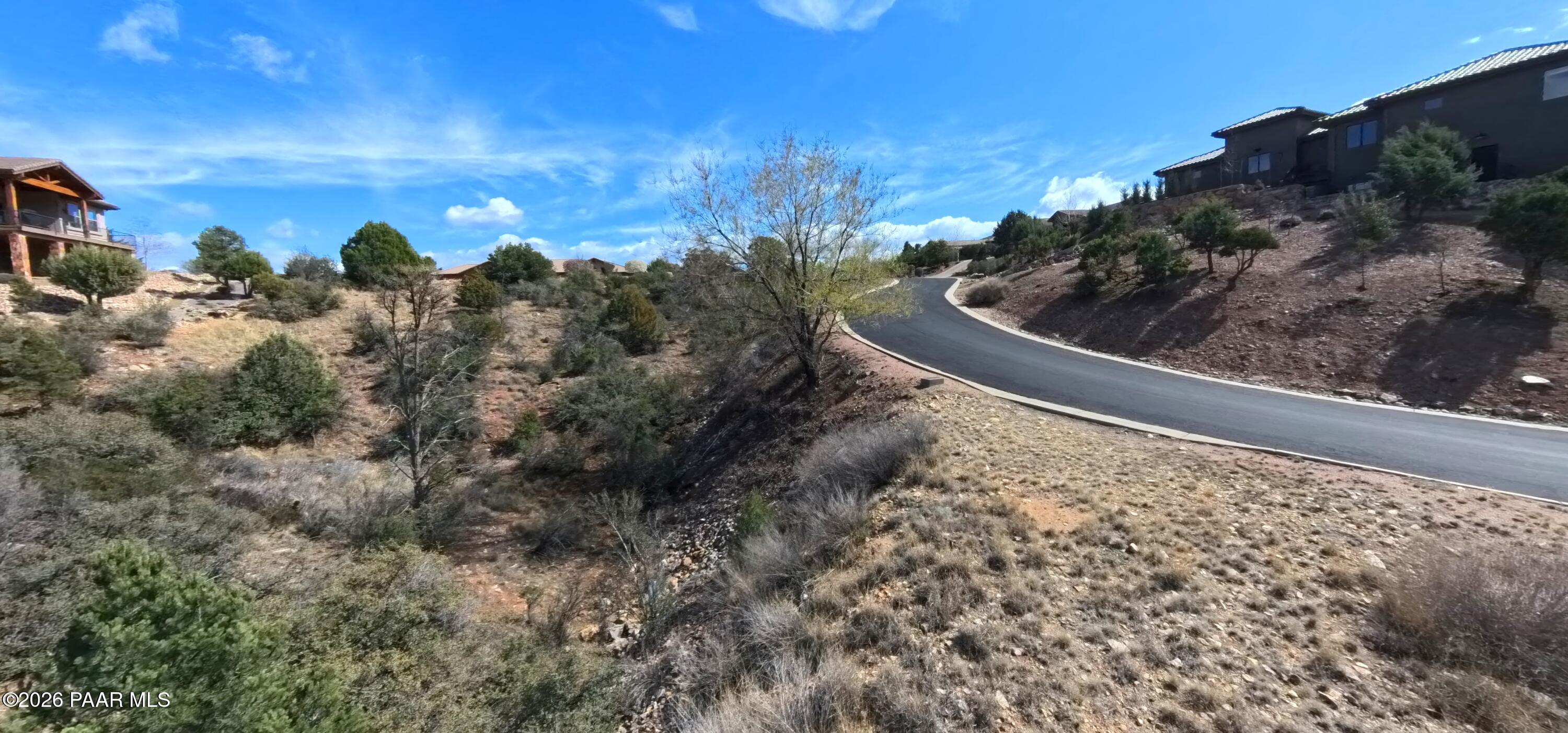 1997 Promontory Prescott, AZ 86305 - Photo 12 of 36 a view of a yard with wooden fence