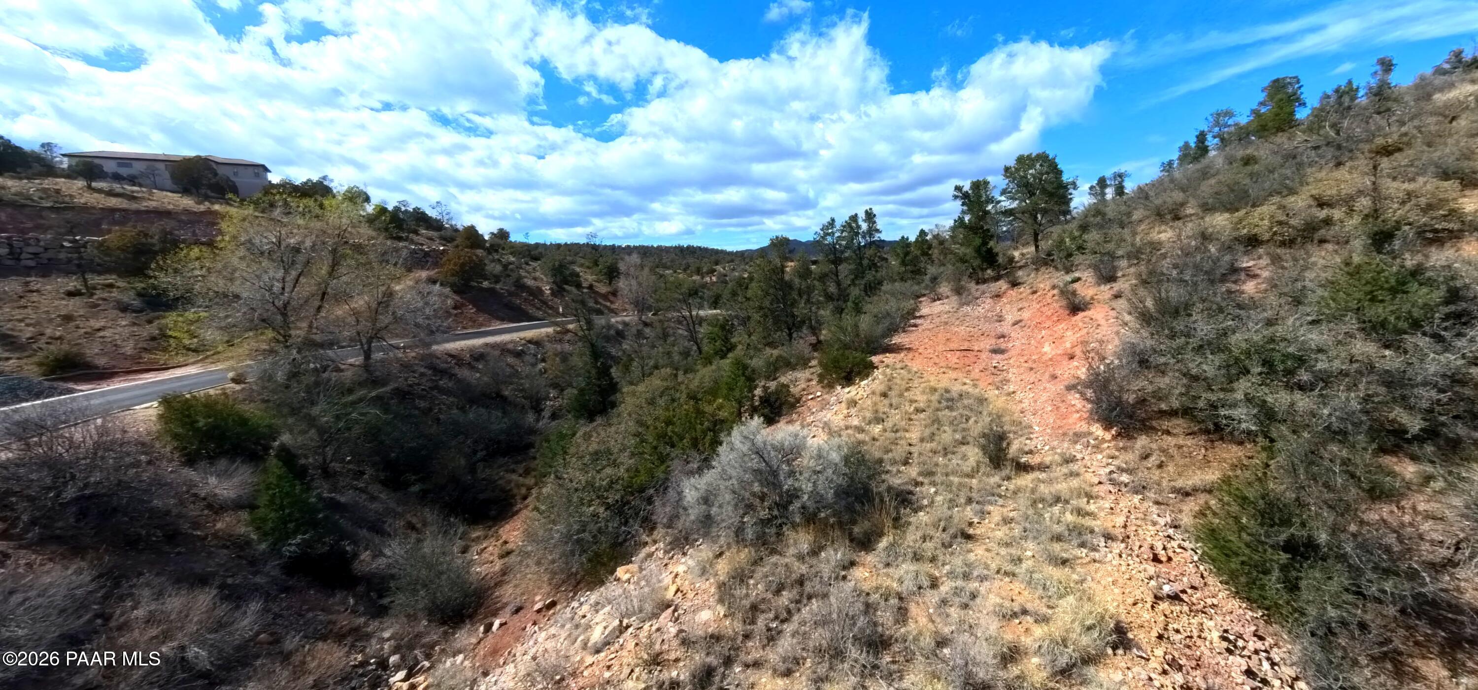 1997 Promontory Prescott, AZ 86305 - Photo 14 of 36 a view of a yard with wooden fence