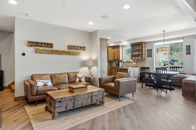 3148 Lower Saddleback Road Park City, UT 84098 - Photo 7 of 67 Open-concept living space featuring wood-finish flooring, recessed lighting, and a neutral color palette