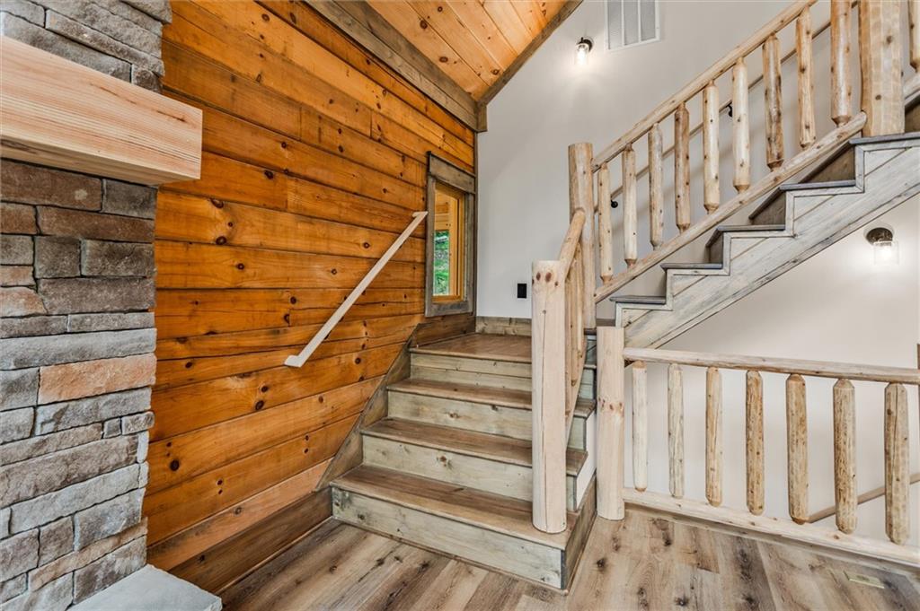 1725 Cherokee Gold Trail Ball Ground, GA 30107 - Photo 25 of 57 a view of entryway with wooden floor