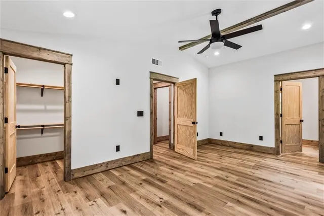 a bathroom with a shower toilet and sink