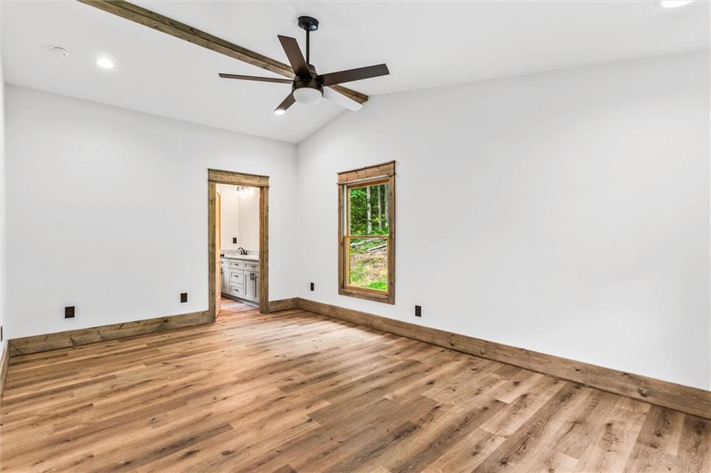 1725 Cherokee Gold Trail Ball Ground, GA 30107 - Photo 29 of 57 wooden floor in an empty room