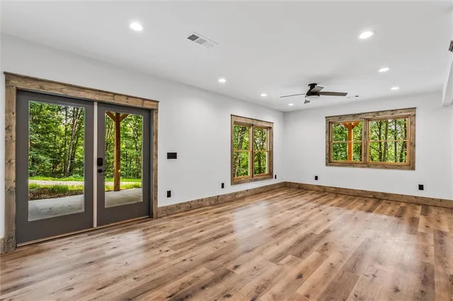 a outdoor space with the couches and a potted plant