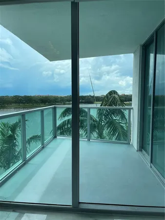 a view of a glass door and porch
