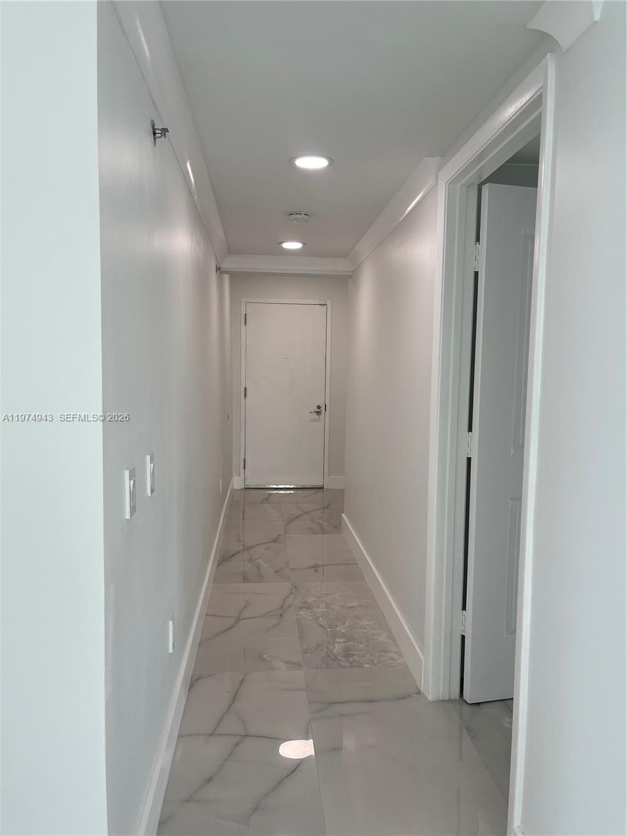 2681 North Flamingo Road, Unit 401S Sunrise, FL 33323 - Photo 4 of 18 a view of hallway