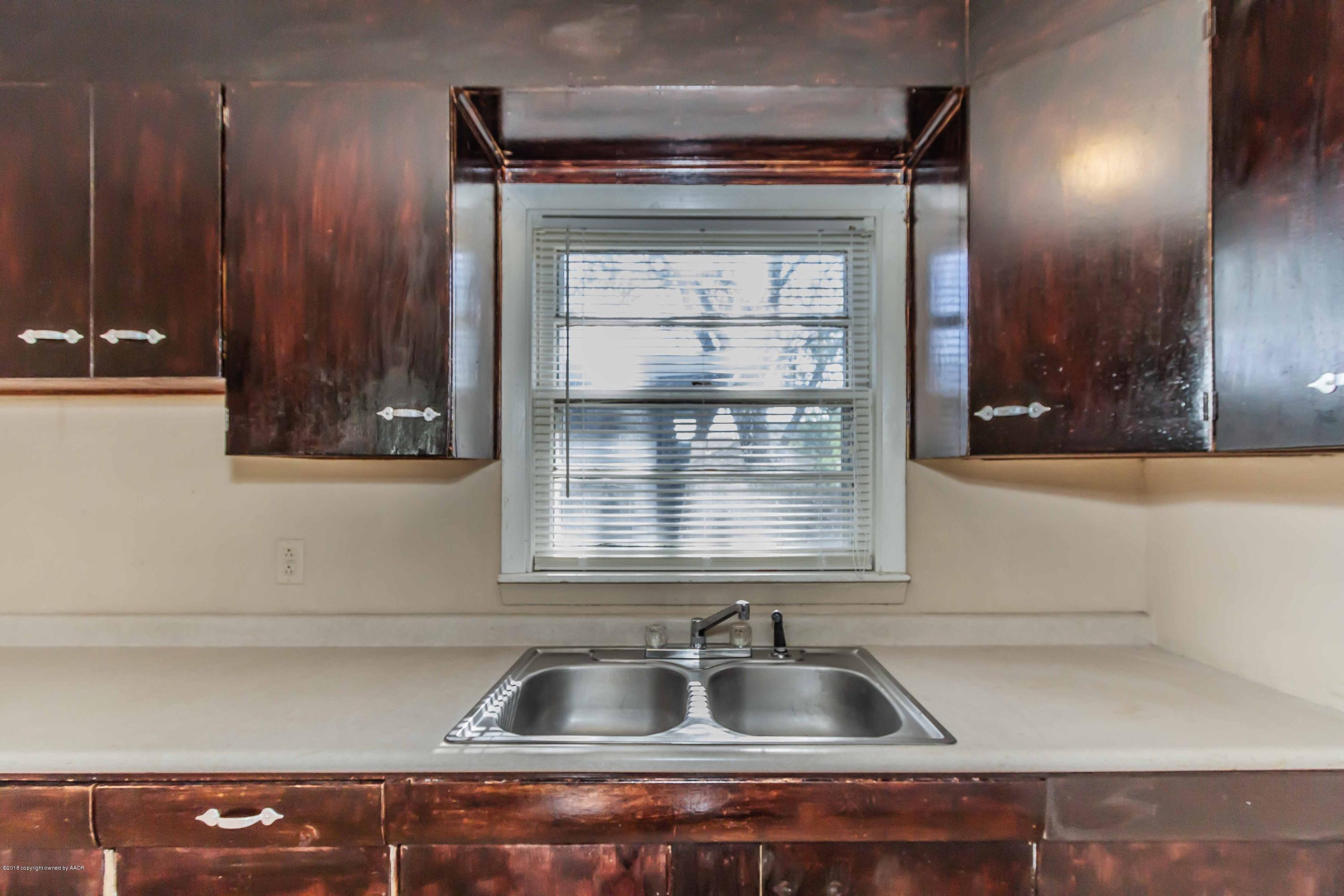 4307 Gables Street Amarillo, TX 79110 - Photo 11 of 32 a close view of sink and tap