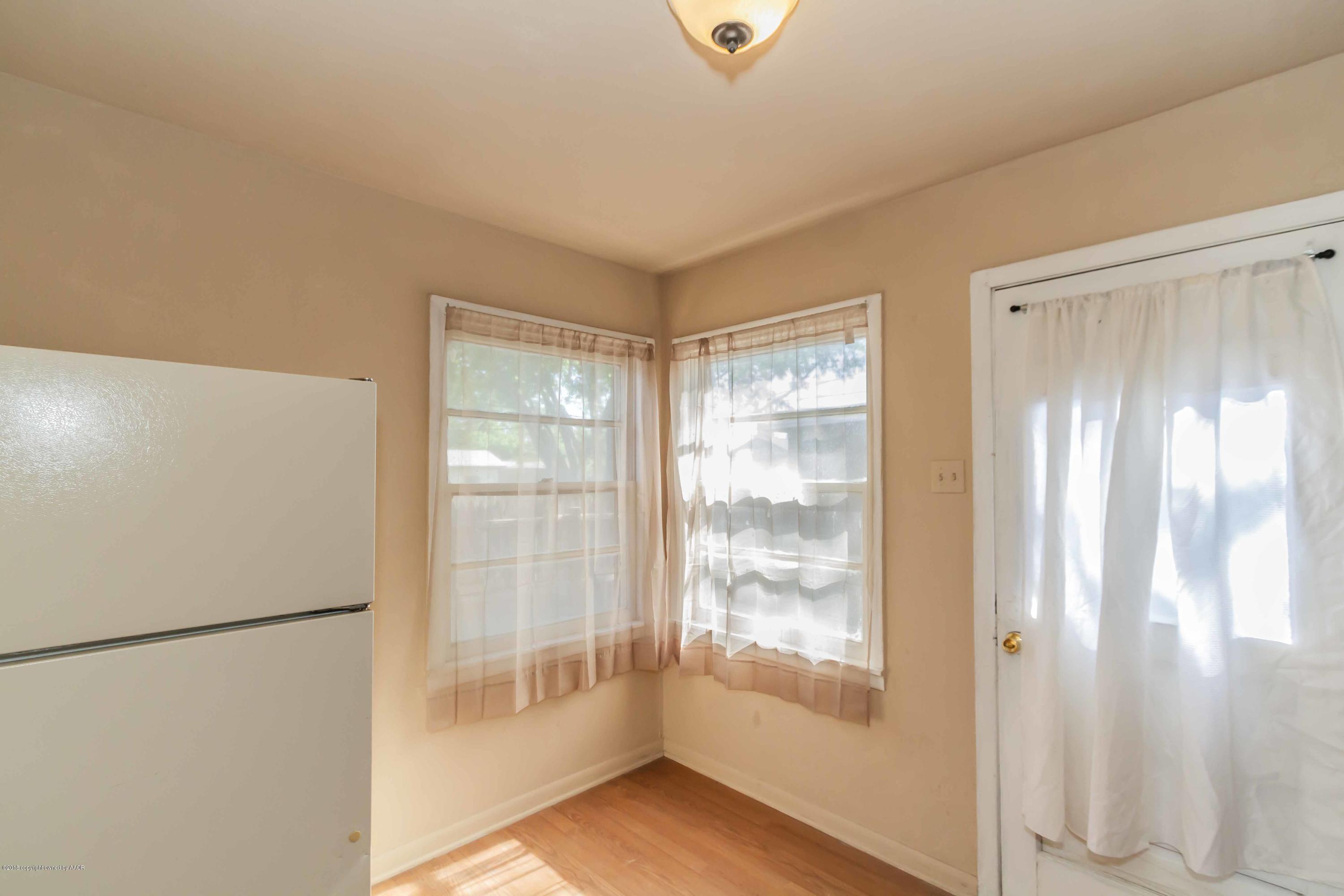 4307 Gables Street Amarillo, TX 79110 - Photo 13 of 32 a view of empty room with window