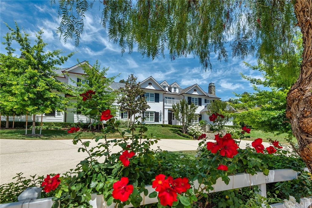 25200 Jim Bridger Road Hidden Hills, CA 91302 - Photo 1 of 1 a view of street with flower and trees
