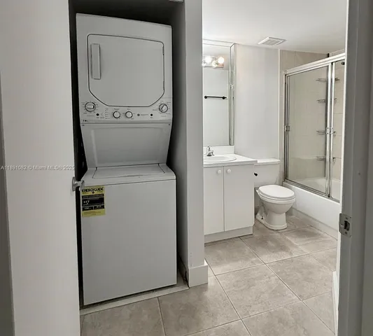 a bathroom with a toilet and a sink