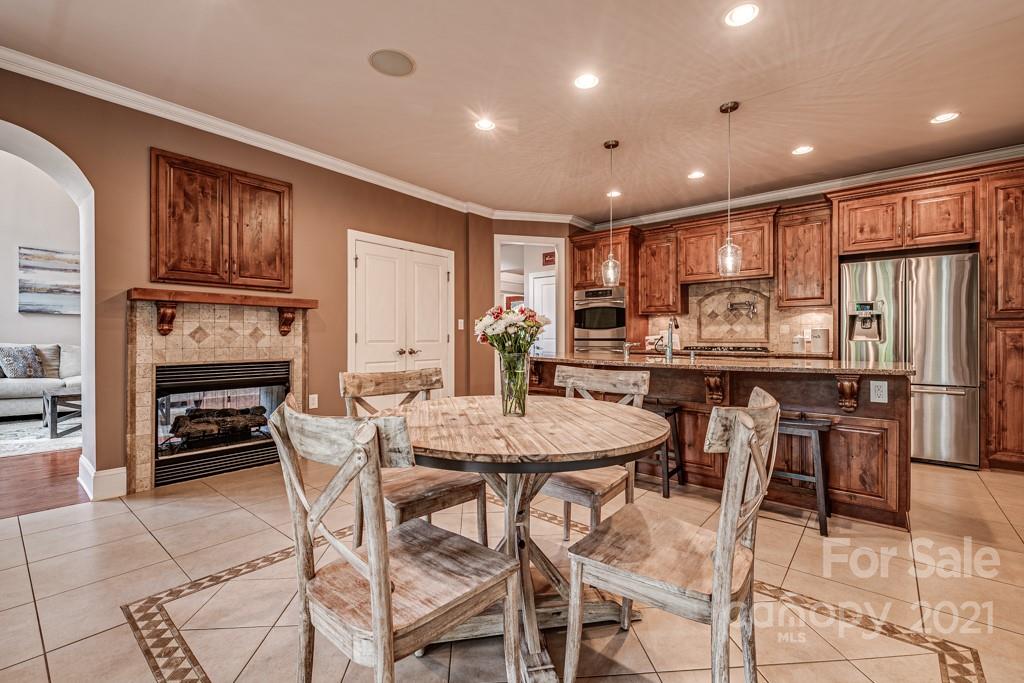 150 Canterbury Crossing Fort Mill, SC 29708 - Photo 11 of 48 a view of a dining room with furniture