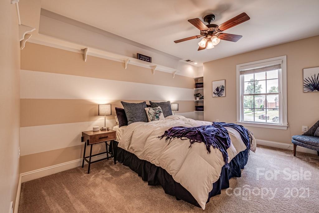 150 Canterbury Crossing Fort Mill, SC 29708 - Photo 34 of 48 a bedroom with a bed and a window