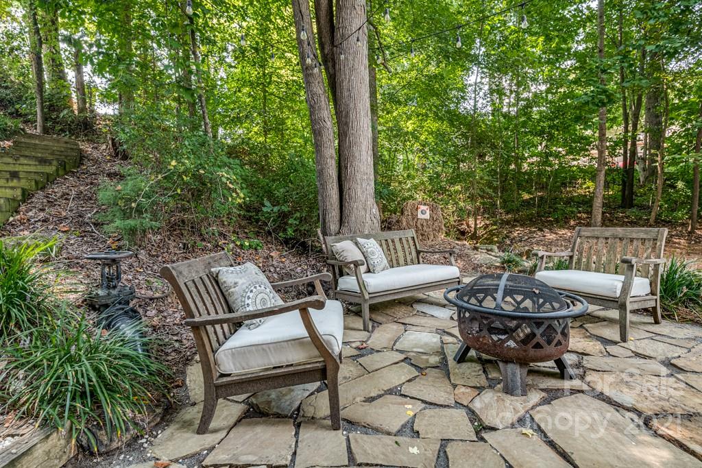 150 Canterbury Crossing Fort Mill, SC 29708 - Photo 37 of 48 a view of a backyard with sitting area
