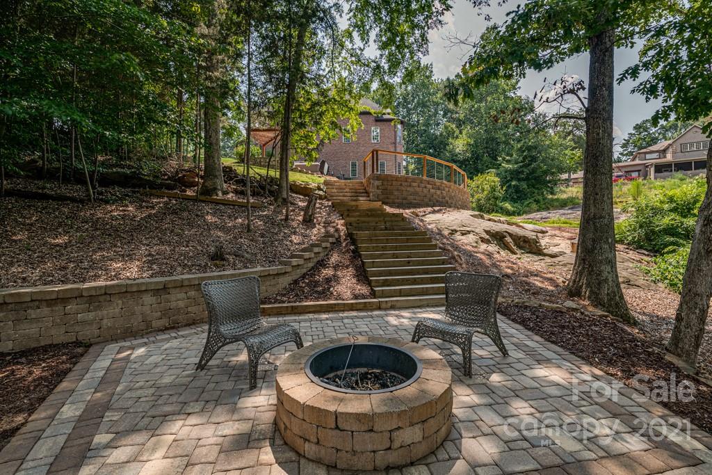 150 Canterbury Crossing Fort Mill, SC 29708 - Photo 39 of 48 a view of a chairs and tables in backyard