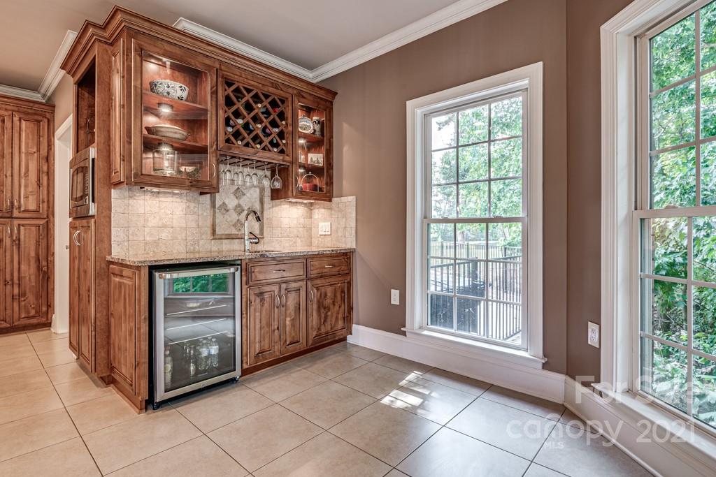 150 Canterbury Crossing Fort Mill, SC 29708 - Photo 10 of 48 a view of kitchen with granite countertop cabinets and outdoor view