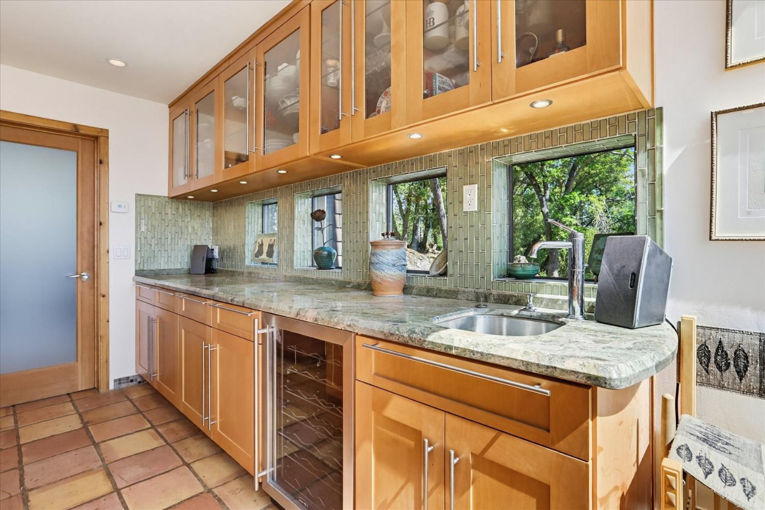 20111 Tanglewood Road Grass Valley, CA 95945 - Photo 24 of 93 a kitchen with stainless steel appliances granite countertop a stove a sink and a refrigerator