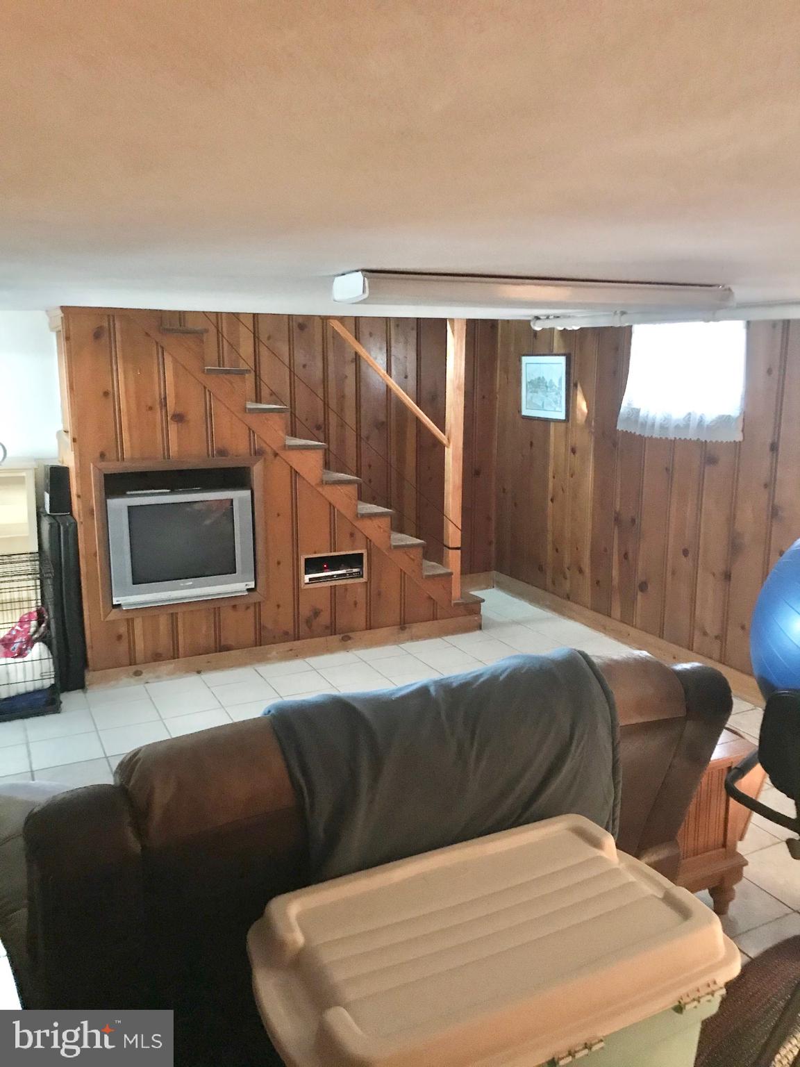 4211 Kensington Road Baltimore, MD 21229 - Photo 15 of 40 family room lower level