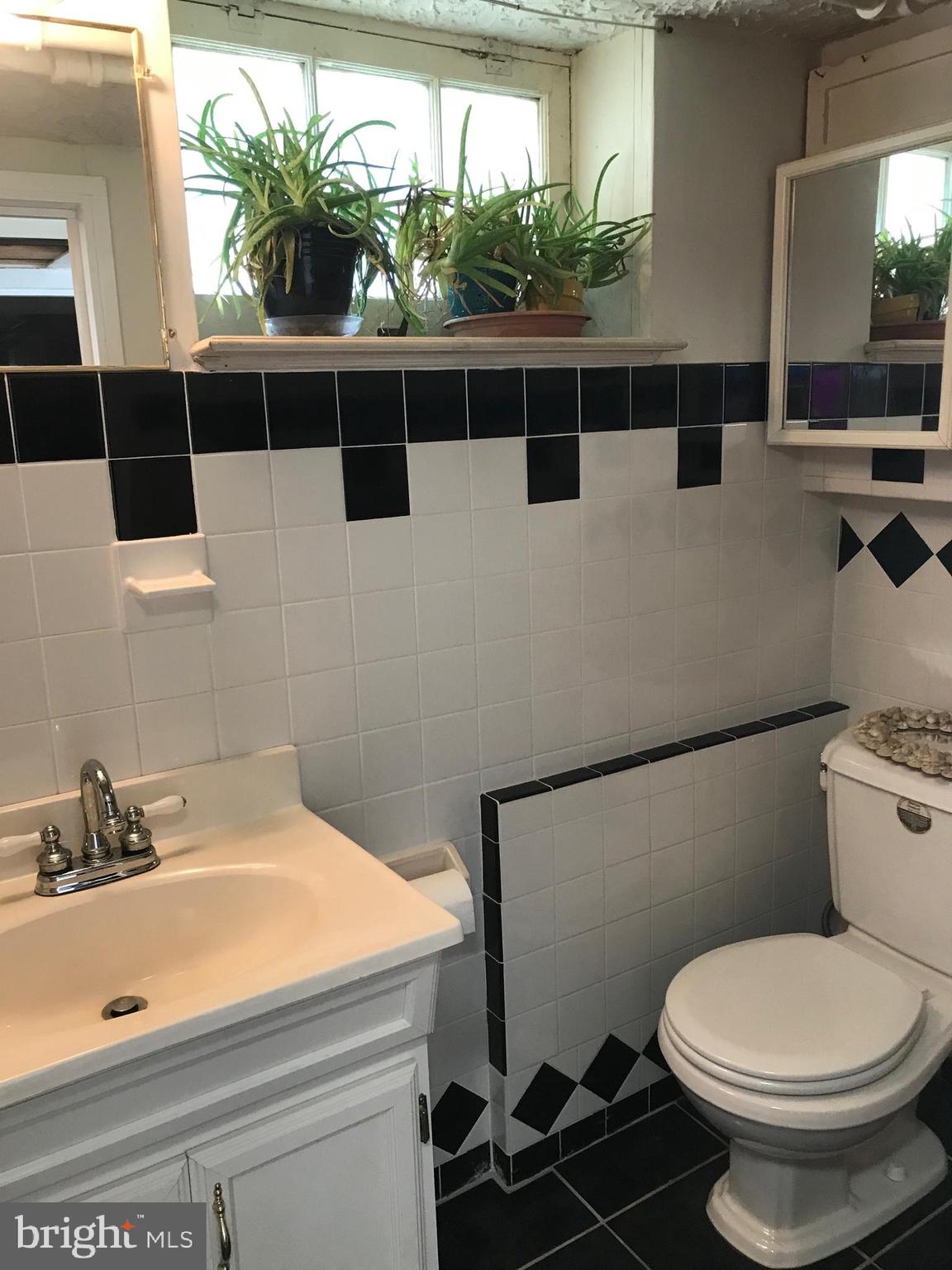 4211 Kensington Road Baltimore, MD 21229 - Photo 17 of 40 lower level half bath