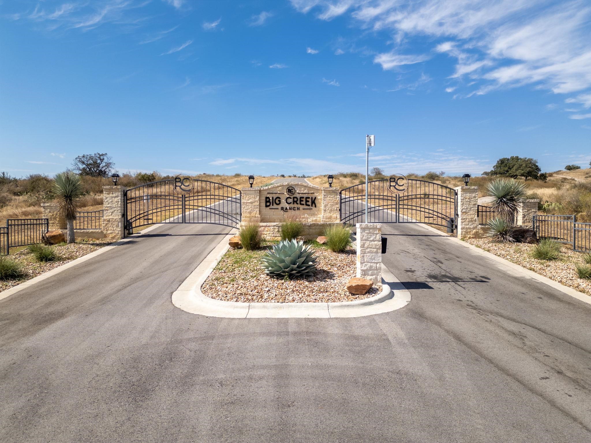 Tbd Tbd Falling Waters Drive Kingsland, TX 78639 - Photo 2 of 19 a tall building with a view of a swimming pool