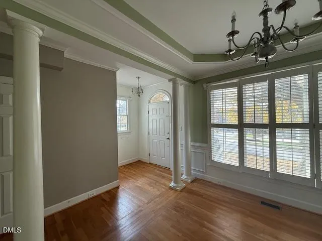 a view of entryway with wooden floor