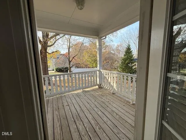 a view of a wooden balcony