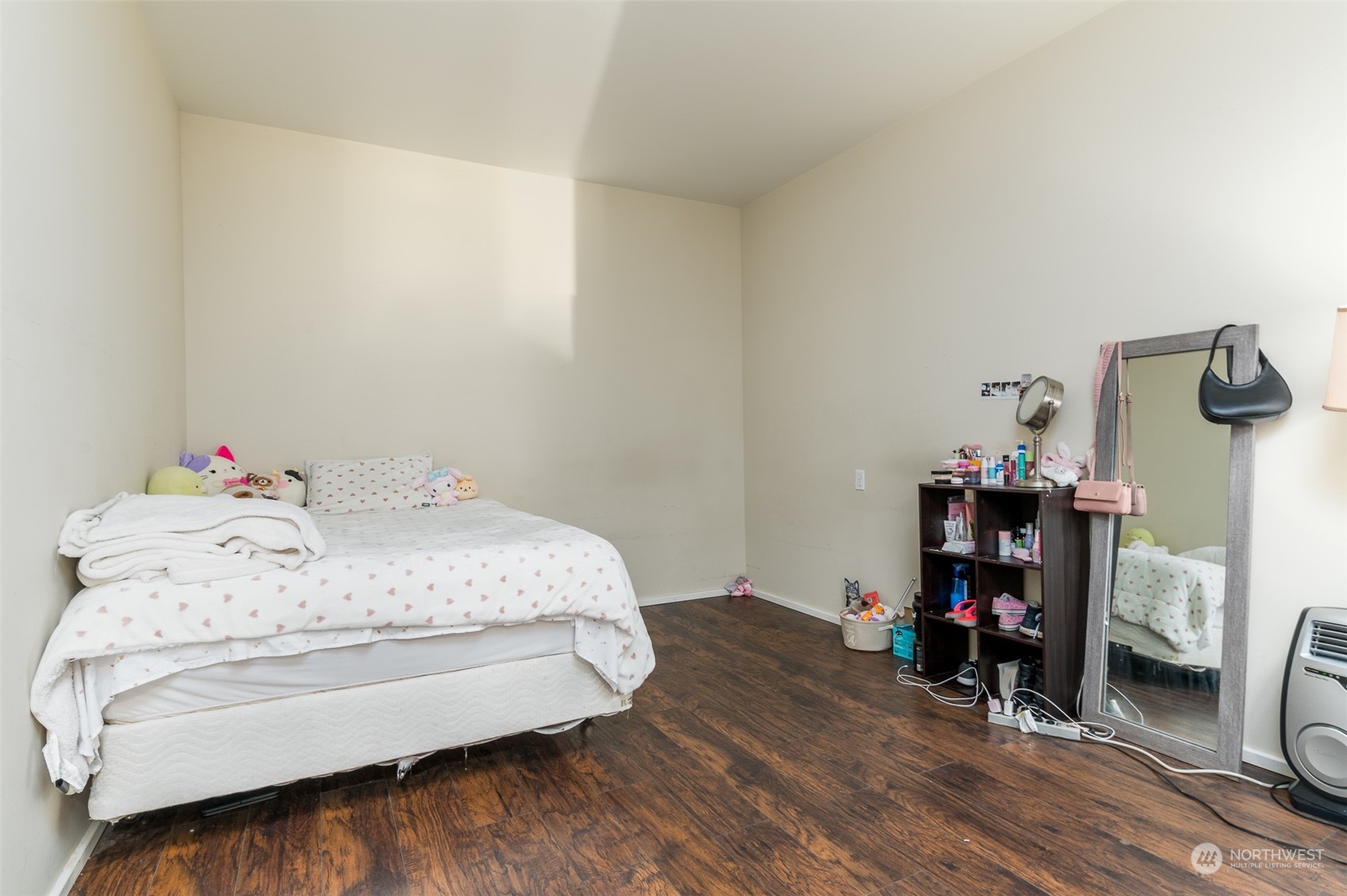 403 Rohrer Loop Sedro-Woolley, WA 98284 - Photo 12 of 24 a bed sitting in a bedroom next to a window