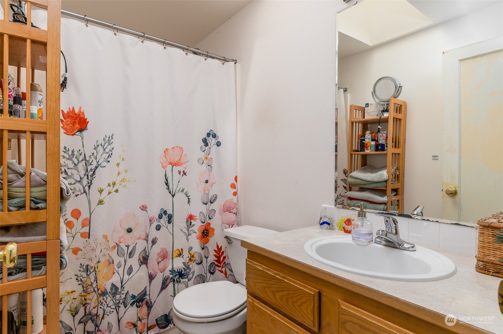 403 Rohrer Loop Sedro-Woolley, WA 98284 - Photo 14 of 24 a bathroom with a sink toilet and shower