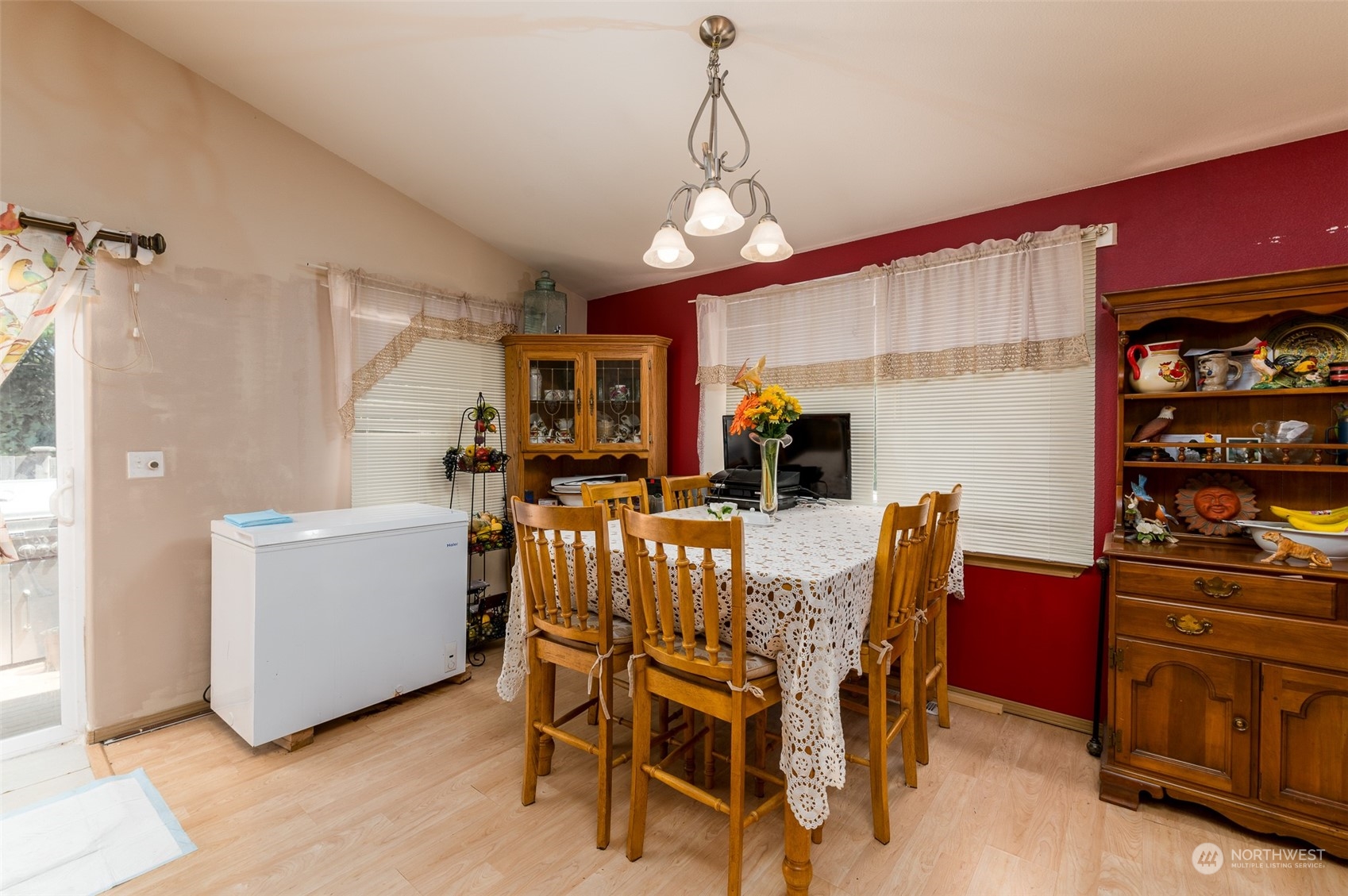 403 Rohrer Loop Sedro-Woolley, WA 98284 - Photo 6 of 24 a view of a dining room with furniture and chandelier