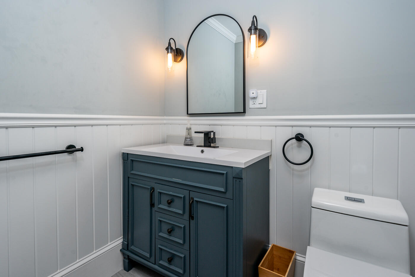 157 Lumbert Mill Road Centerville, MA 02632 - Photo 29 of 42 a bathroom with a toilet sink and mirror